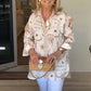 Dameshemd met lange mouwen en oversized knoopsluiting